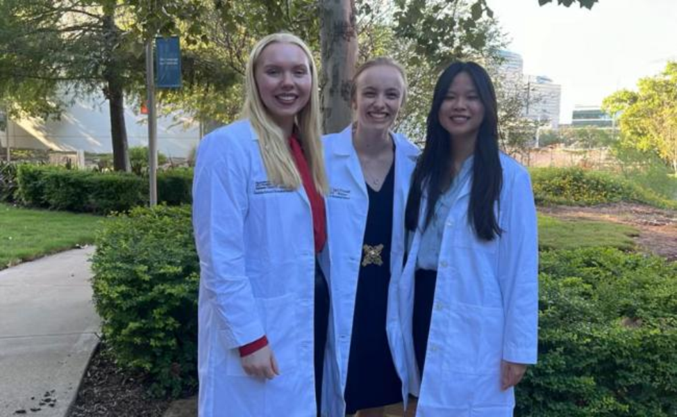 DeBruine and friends in lab coats